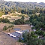 view-of-meadow-and-horse-stables-maycamas-mountains